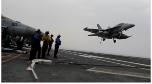 An F/A-18 fighter jet lands on the USS Harry S. Truman aircraft carrier in the eastern Mediterranean Sea, May 4, 2018. REUTERS/Alkis Konstantinidis/File Photo Purchase Licensing Rights